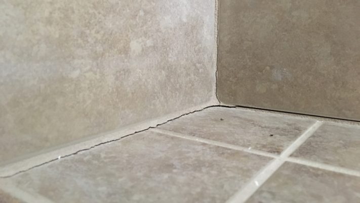 avoid-cracked-grout-caulk-tile-shower-corners-angi-angie-s-list